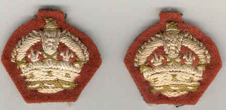 Cloth crowns backed by "dull cherry" as worn by RCAMC officers.