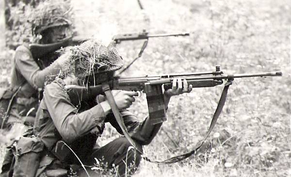 FN C2 LMG (foreground) and FN C1 Assault Rifle.  Seaforth Highlanders on exercise in Fort Lewis,Washington in the early 1980s.  The C2 was a heavy barreled full auto version of the semi-automatic C1.Photo courtesy Steve Marshall