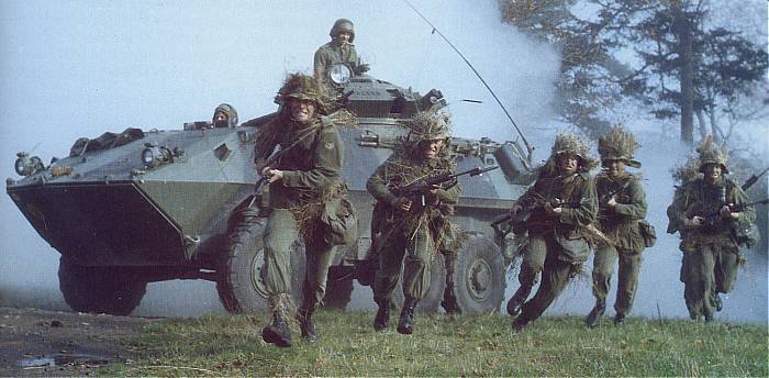Soldiers from the Loyal Edmonton Regiment (4 PPCLI) dismount and go into an attack with fixed bayonets as their Grizzly covers them with the turret mounted weapons (DND Photo)